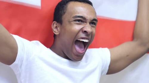 Excited Man Yelling with Flag