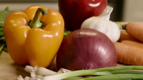Fresh Vegetables Displayed on Wooden Cutting Board