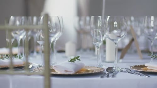 Elegant Wedding Reception Table Setting with Gold Accents
