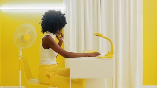 Woman Has Business Phone Talk In Creative Office