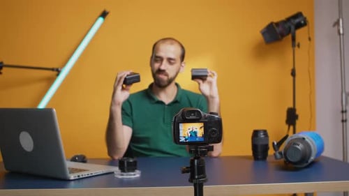 Man Recording Video Review of Tech Device