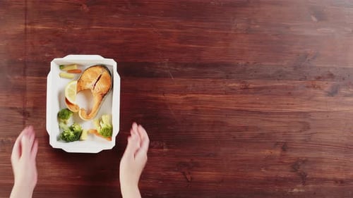 Food Delivery Top View Take Away Meals in Disposable Containers on Wooden Table