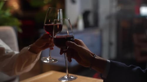 Couple Celebrating Anniversary with Wine Glasses