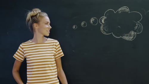 Woman in front of Chalkboard with Thought Bubble