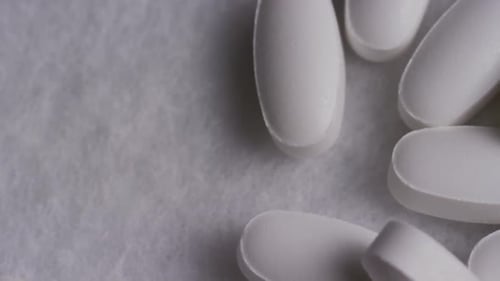 Rotating stock footage shot of vitamins and pills - VITAMINS 0143