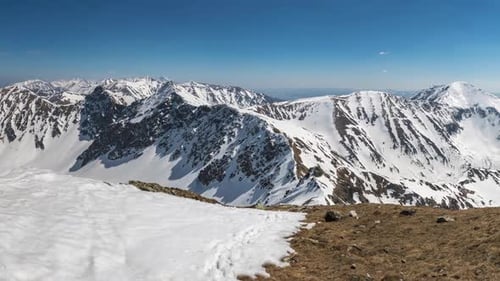 Panoramic View of Snowy Alps Mountains