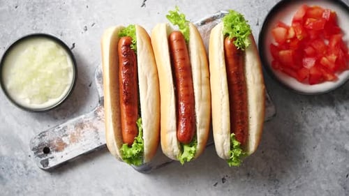 Hot Dogs with Lettuce, Onion, and Tomato
