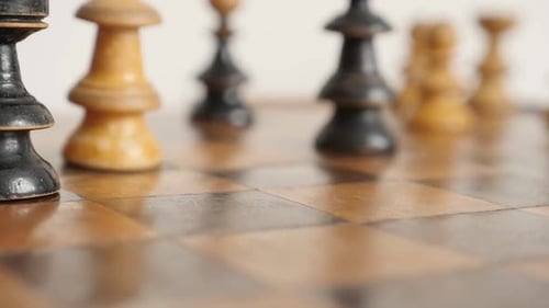 Shallow DOF end of game of wooden chess match slow-mo 1920X1080 HD footage - Slow motion of white