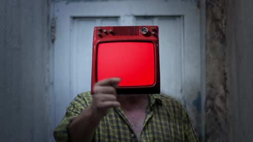 Red Television Set Head in a Dark Room