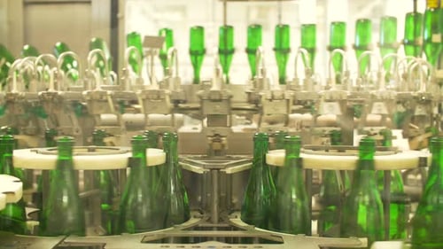 Champagne Bottles on Factory Conveyor Belt