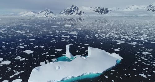 Melting Icebergs, Ocean Ice, Snow Coast. Aerial View. Environment Global Warming