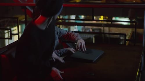 Programmers Developing Software in Café