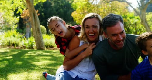 Happy family having fun in park 4k
