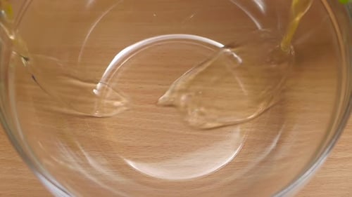 Two Fresh Egg Yolks in Clear Glass Bowl