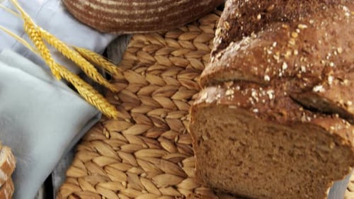 Fresh Rye Bread Loaf with Wheat Decoration