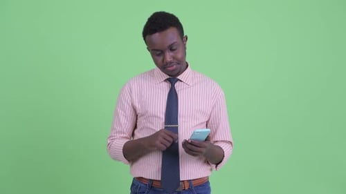 Young Adult Using Phone Shows Disapproval