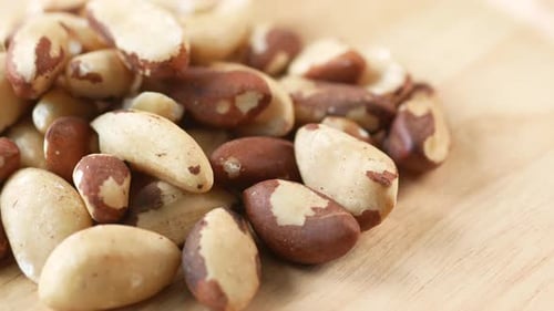 Close Up of Brazilian Nut on Wooden Table