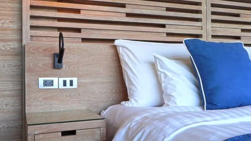 Hotel Room with King Size Bed and Wood Headboard