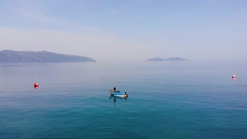 Aerial view from drone. Fishermen use traditional fishing nets in the sea in the morning