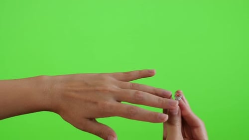 Trying new ring on green screen chroma key background 4K 3840X2160 UltraHD footage - Greenscreen wom