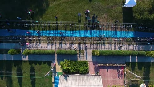 Aerial View of Triathlon Event on Sunny Day