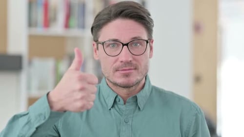 Man Giving Thumbs Up Close Up Shot