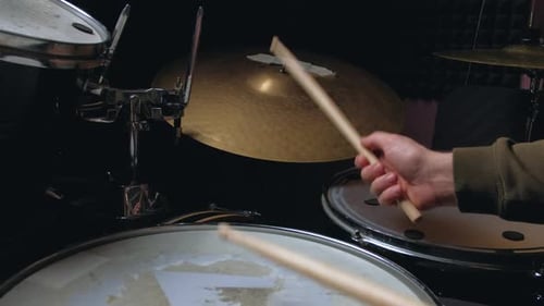 Drummer Playing a Cymbal Close Up
