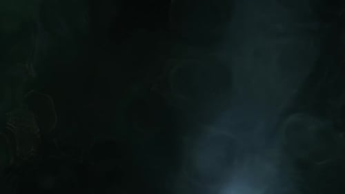 Abstract Drifting Shapes on a Dark Background