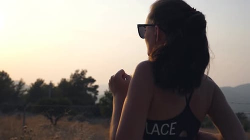 Profile of Sporty Girl Jogging in Country Road