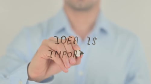 Idea is Important, Man Writing on Transparent Screen