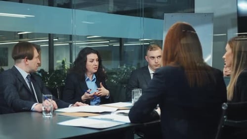 Group of Business People Having Meeting in Office