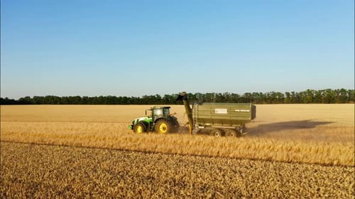 A Car for Transporting Grain Travels Through the Field