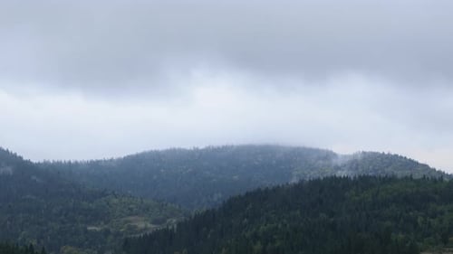 Mountains in fog and clouds timelapse