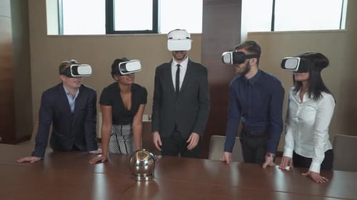 People Experiencing Virtual Reality in Modern Office