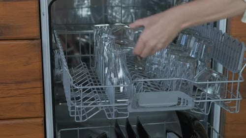 Loading Black Dishes and Glasses into Dishwasher
