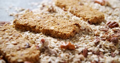 Granola bar with scattered oatmeal