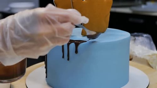 Decorating a Delicious Blue Cake with Chocolate