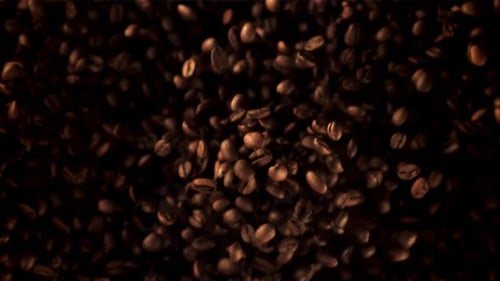 Roasted Coffee Beans Falling, Close Up View