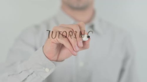 Hand Writes Tutoring on Glass Surface with Marker