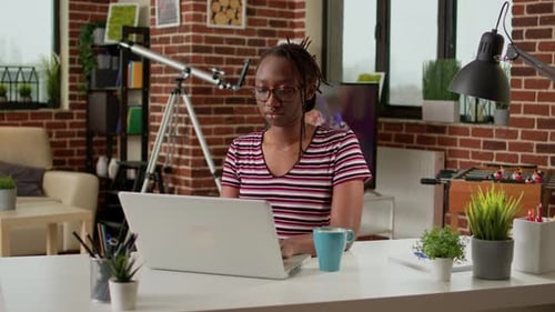 Young Freelancer Doing Remote Distant Work on Laptop Computer