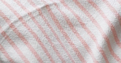 Close Up Shot of Striped White and Pink Material