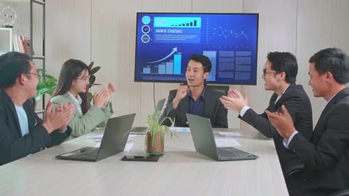 Team Celebrates Success in Modern Workplace