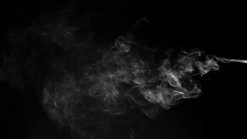 Abstract White Smoke Drifting on Black Background