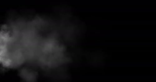Flowing White Smoke Against Black Background