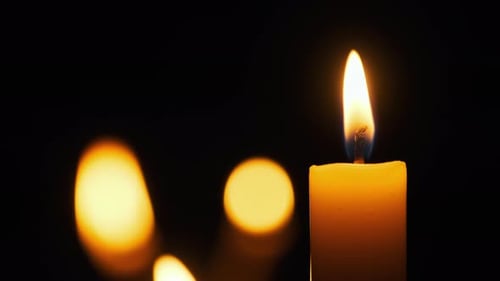 Candles Flame on Black Background