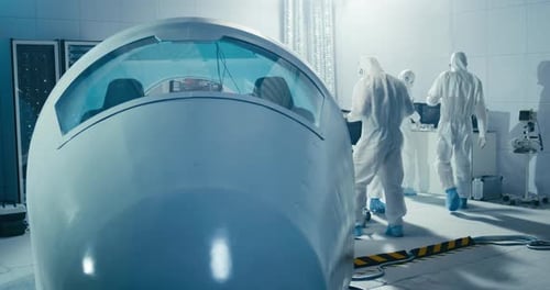 Engineers Working in Clean Room