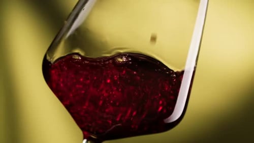 Pouring Red Wine into Glass Close Up
