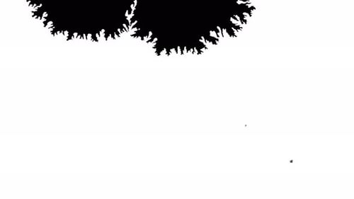 Black Ink Drop Spreads on White Surface