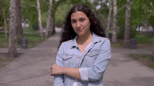 Portrait of an Attractive Young Girl with Long Hair