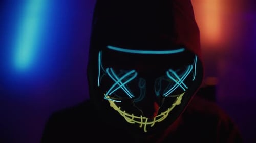 Hacker is Working on Laptop at Night